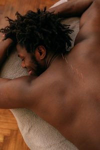 A man receiving acupuncture treatment, focusing on wellness and relaxation.